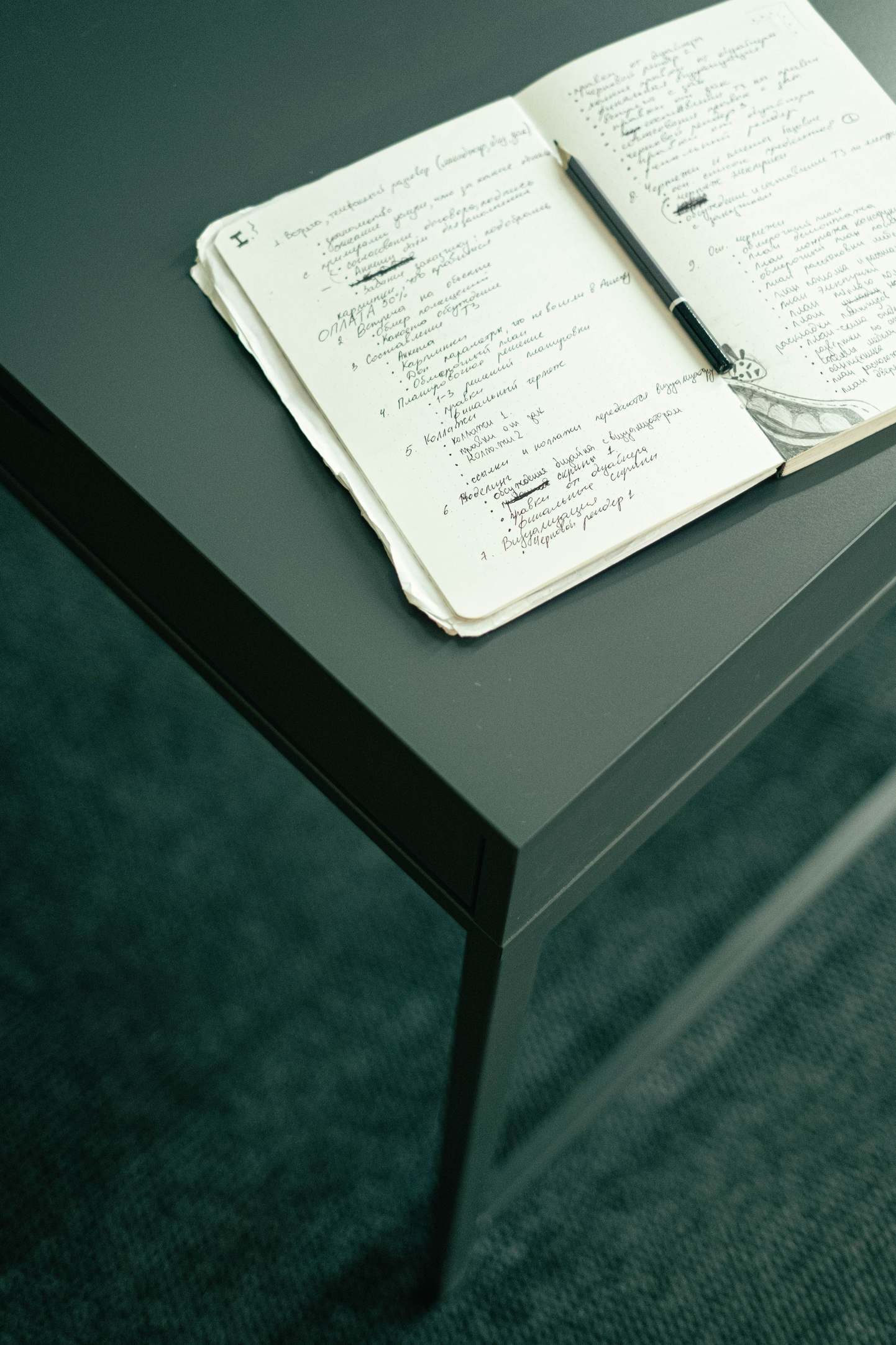 Handwritten notes and records in a notebook